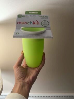 Green children's spill-proof cup